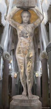 A caryatid stands in a cathedral, a golden halo behind her head, and machinery visible within her body. A caryatid stands in a cathedral, a golden halo behind her head, and machinery visible within her body.