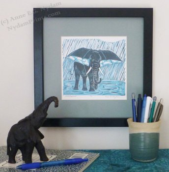 elephant with umbrella ears, standing in the rain elephant with umbrella ears, standing in the rain